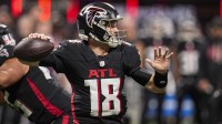 Atlanta Falcons quarterback Kirk Cousins (18) passes the ball against the New Orleans Saints during the second half at Mercedes-Benz Stadium.