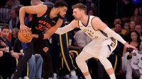 New York Knicks center Karl-Anthony Towns (32) controls the ball against Indiana Pacers center Micah Potter (11) during the first quarter at Madison Square Garden.