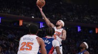 New York Knicks guard Jose Alvarado (5) goes to the basket against the Detroit Pistons during the first half at Madison Square Garden.