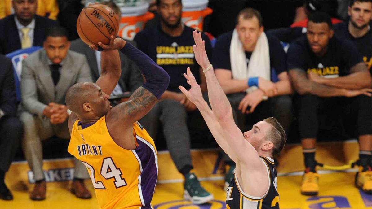 Los Angeles Lakers forward Kobe Bryant (24) shoots against Utah Jazz forward Gordon Hayward (20) during the second half at Staples Center.