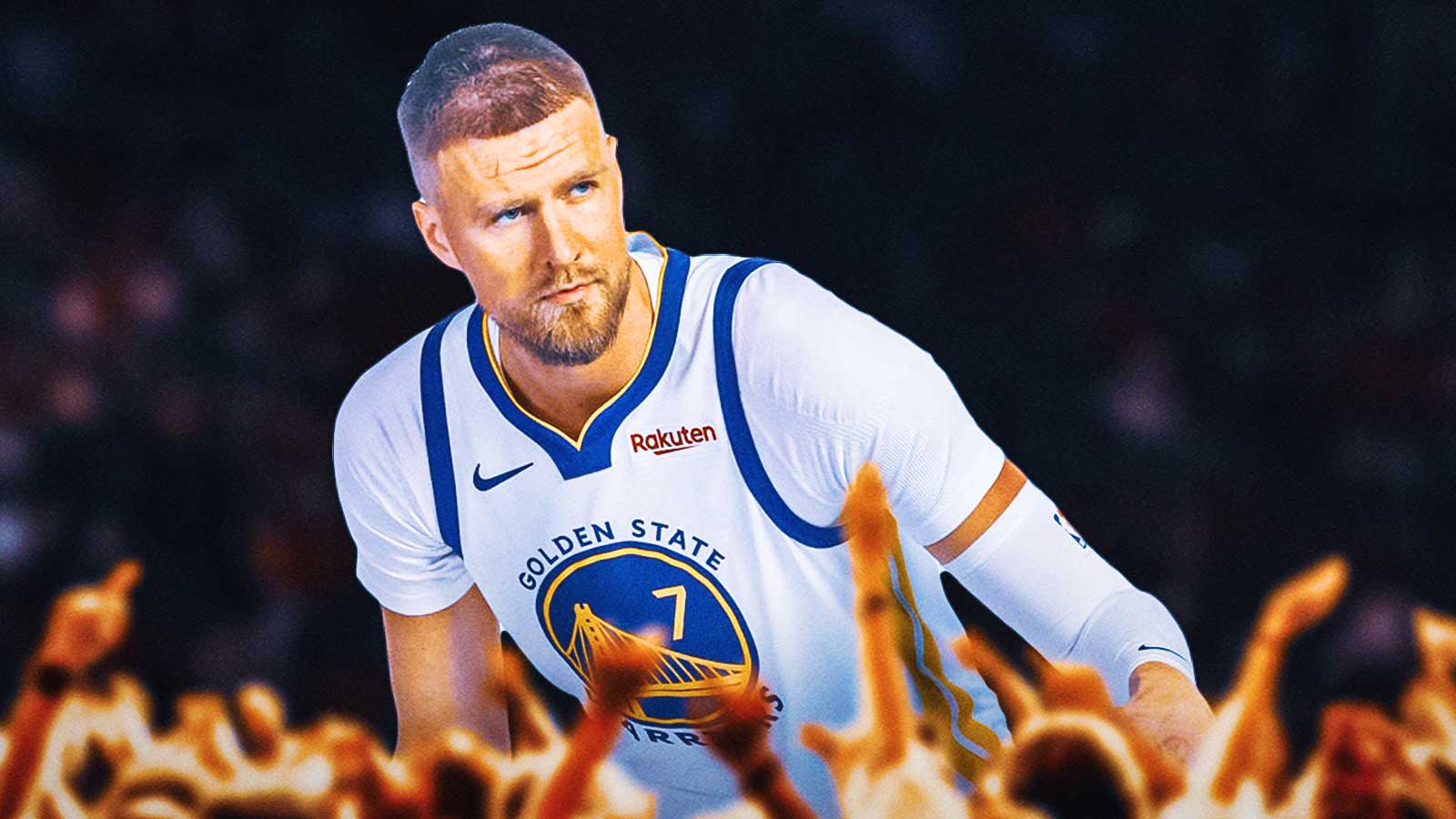 kristaps porzingis in warriors uniform crowd cheers