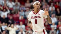 Alabama guard Labaron Philon Jr. (0) signals three after hitting a three pointer against Texas A&M at Coleman Coliseum.