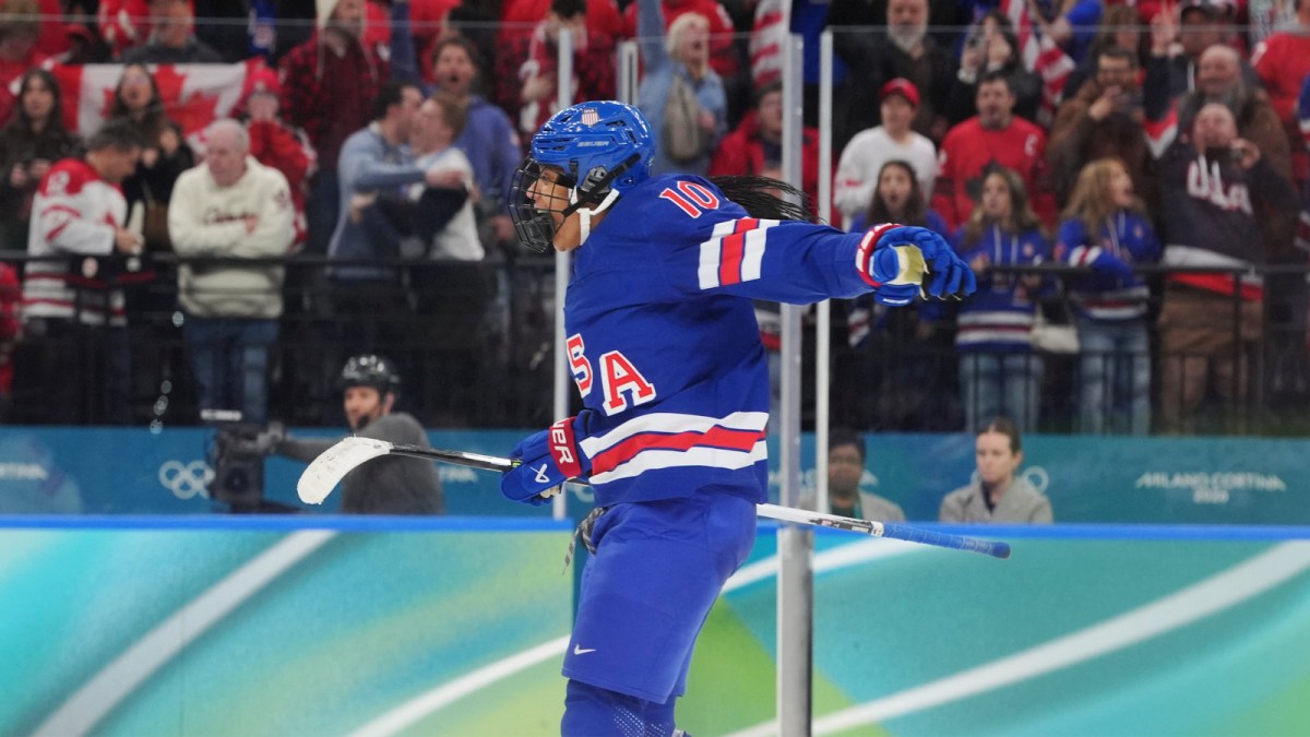 Feb 19, 2026; Milan, Italy; Laila Edwards (10) of the United States reacts after assisting on a goal against Canada in the women's ice hockey gold medal game during the Milano Cortina 2026 Olympic Winter Games at Milano Santagiulia Ice Hockey Arena. Mandatory Credit: Amber Searls-Imagn Images