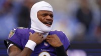 Baltimore Ravens quarterback Lamar Jackson (8) looks on during warmups before the game between the Pittsburgh Steelers and Baltimore Ravens at M&T Bank Stadium.