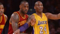 Cleveland Cavaliers forward LeBron James (23) and Los Angeles Lakers forward Kobe Bryant (24) battle for position in the first quarter of the game at Staples Center. Mandatory Credit: Jayne Kamin-Oncea-Imagn Images