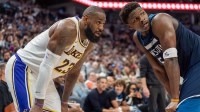 Minnesota Timberwolves guard Anthony Edwards (5) guards Los Angeles Lakers forward LeBron James (23) in the second quarter during game four of first round for the 2025 NBA Playoffs at Target Center.