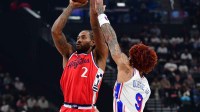 Los Angeles Clippers forward Kawhi Leonard (2) shoots against Philadelphia 76ers guard Kelly Oubre Jr. (9) during the first half at Intuit Dome.