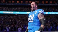 Detroit Lions left tackle Taylor Decker takes the field during player introductions before the Detroit Lions game against the Carolina Panthers at Ford Field in Detroit on Sunday, Oct. 8, 2023.