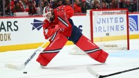 Washington Capitals goaltender Logan Thompson (48) clears the puck against the Nashville Predators during the second period at Capital One Arena.