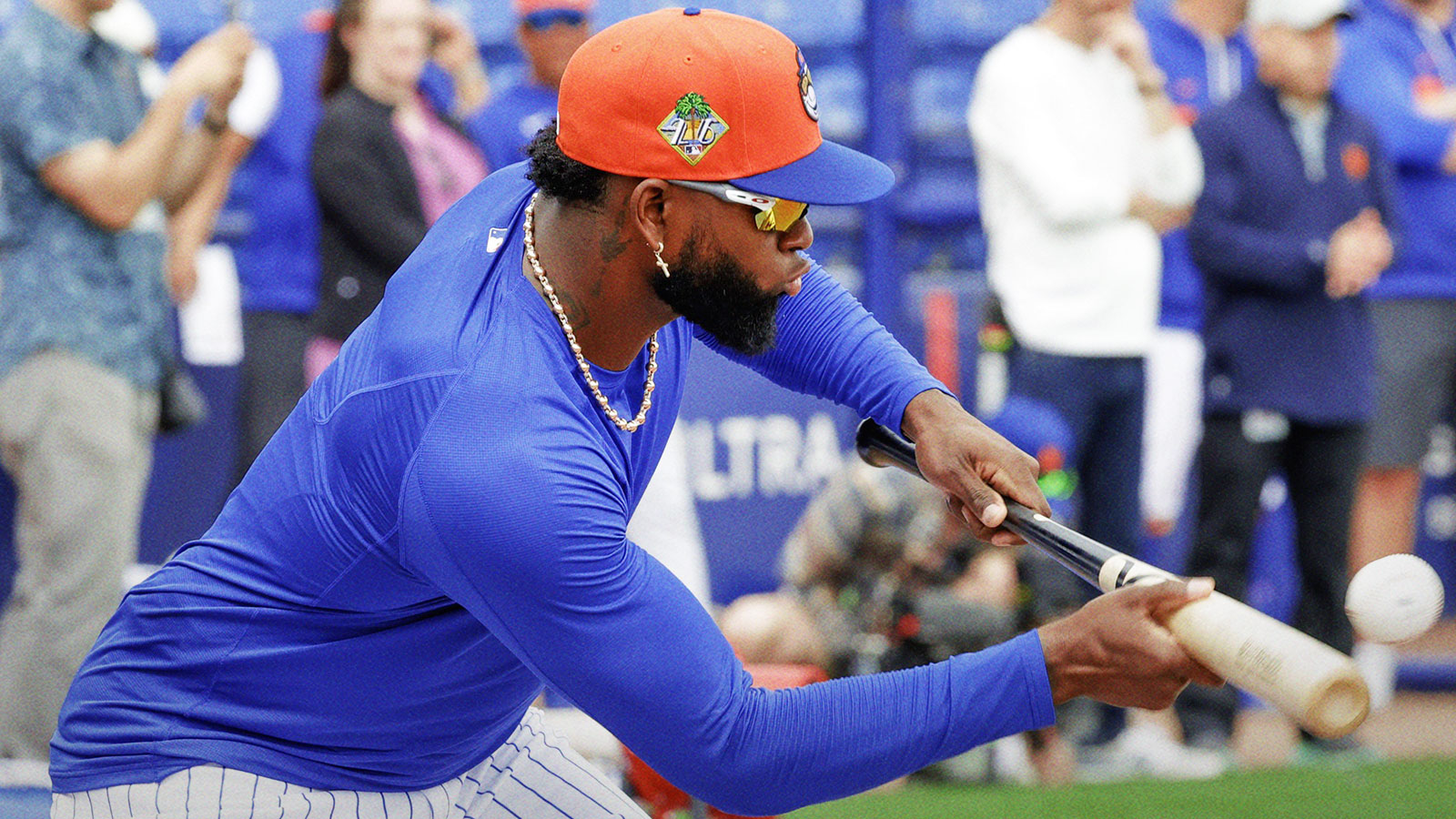 New York Mets outfielder Luis Robert Jr. (88) bunts the ball during the New York Mets spring training workouts at Clover Park.