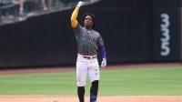 New York Mets second baseman Luisangel Acuna (2) reacts after hits an RBI double during the fifth inning against the Cincinnati Reds at Citi Field.