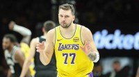 Los Angeles Lakers guard Luka Doncic (77) gestures after scoring in the third quarter against the Brooklyn Nets at Barclays Center.