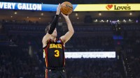 Atlanta Hawks guard Luke Kennard (3) shoots against the Oklahoma City Thunder during the first quarter at Paycom Center.