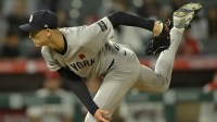 New York Yankees relief pitcher Luke Weaver (30) delivers to the plate in the ninth inning against the Los Angeles Angels at Angel Stadium.