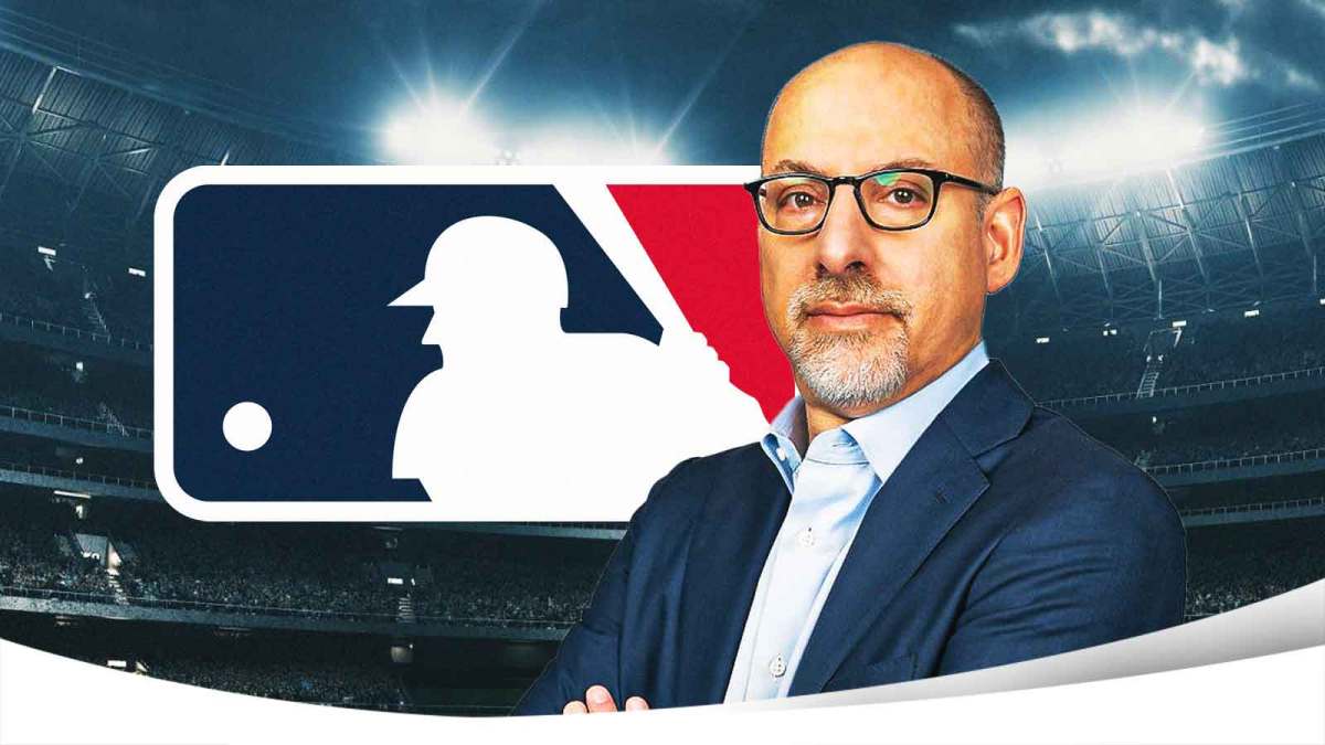 Bruce Meyer next to the MLB logo