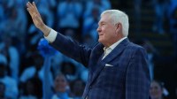 Former North Carolina Tar Heels football coach Mack Brown is honored during a time out in the first half at Dean E. Smith Center.