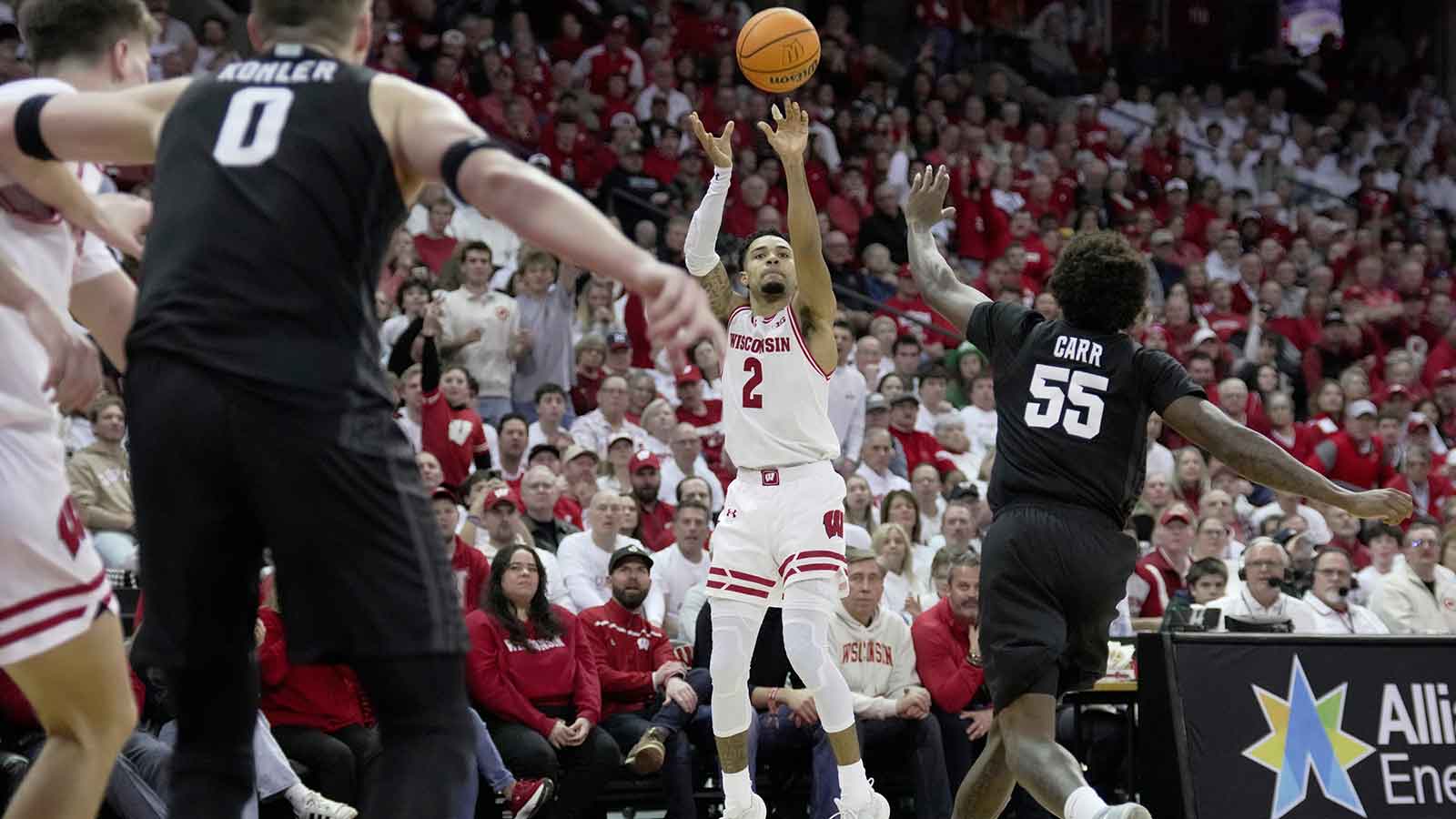 Wisconsin guard Nick Boyd (2) hits a three-point basket during the second half of their game Friday, February 13, 2026 at the Kohler Center in Madison, Wisconsin. Wisconsin beat 10th ranked Michigan State 92-71.