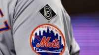 New York Mets logo on the sleeve of J.D. Martinez during a game against the Philadelphia Phillies at Citizens Bank Park.