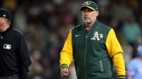 Athletics manager Mark Kotsay (7) walks back towards the clubhouse after getting ejected from the game against the Kansas City Royals during the ninth inning at Sutter Health Park
