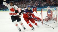 Mark Stone of Canada celebrates scoring their second goal against Czechia in a men's ice hockey group A match during the Milano Cortina 2026 Olympic Winter Games at Milano Santagiulia Ice Hockey Arena.
