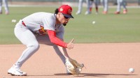 St. Louis Cardinals shortstop Masyn Winn (0) fields a ground ball during spring training workouts at Roger Dean Stadium.