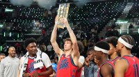 Feb 13, 2026; Inglewood, California, USA; Team Vince frontcourt Matas Buzelis (14) of the Chicago Bulls celebrates with the trophy after defeating Team Melo during an NBA All Star Rising Stars championship game at Intuit Dome. Mandatory Credit: Kirby Lee-Imagn Images