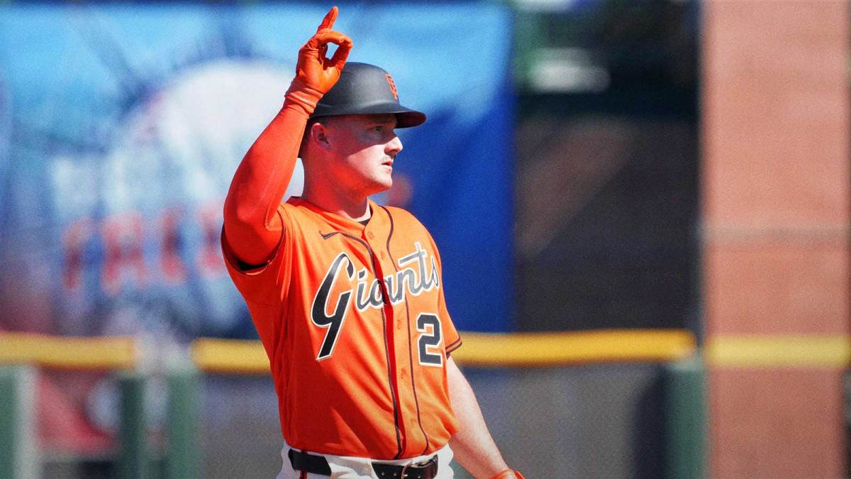 San Francisco Giants third baseman Matt Chapman (26) reacts after hitting a double against the Chicago Cubs in the third inning at Scottsdale Stadium.