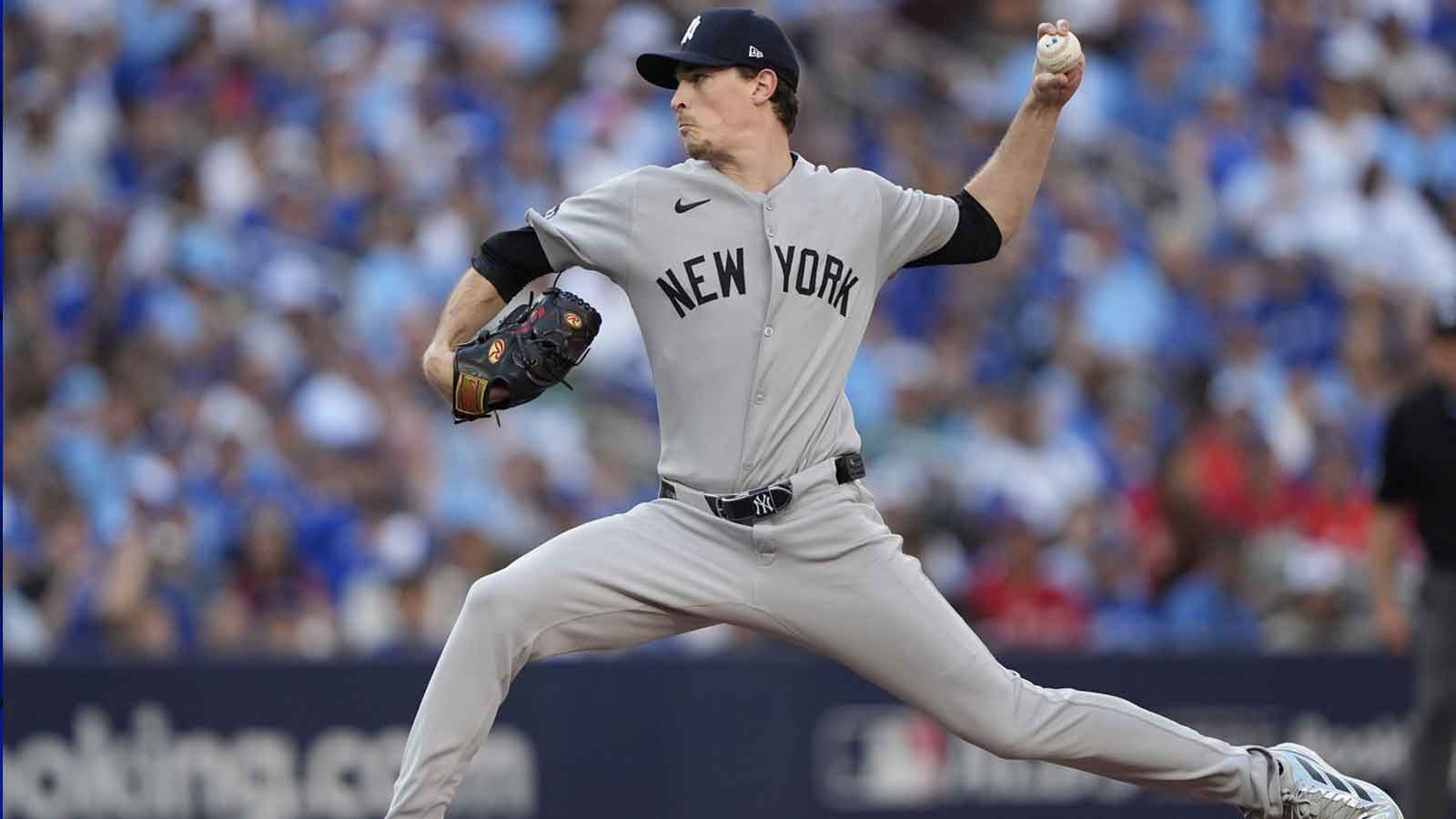 New York Yankees pitcher Max Fried (54) throws in the fourth inning against the Toronto Blue Jays during game two of the ALDS round for the 2025 MLB playoffs at Rogers Centre.