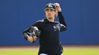 New York Yankees pitcher Max Fried (54) works out during spring training workouts at George M. Steinbrenner Field.