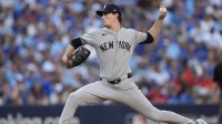 New York Yankees pitcher Max Fried (54) throws in the fourth inning against the Toronto Blue Jays during game two of the ALDS round for the 2025 MLB playoffs at Rogers Centre.
