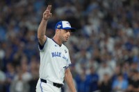 Toronto Blue Jays pitcher Max Scherzer (31) reacts after being relieved against the Los Angeles Dodgers in the fifth inning for game seven of the 2025 MLB World Series at Rogers Centre.