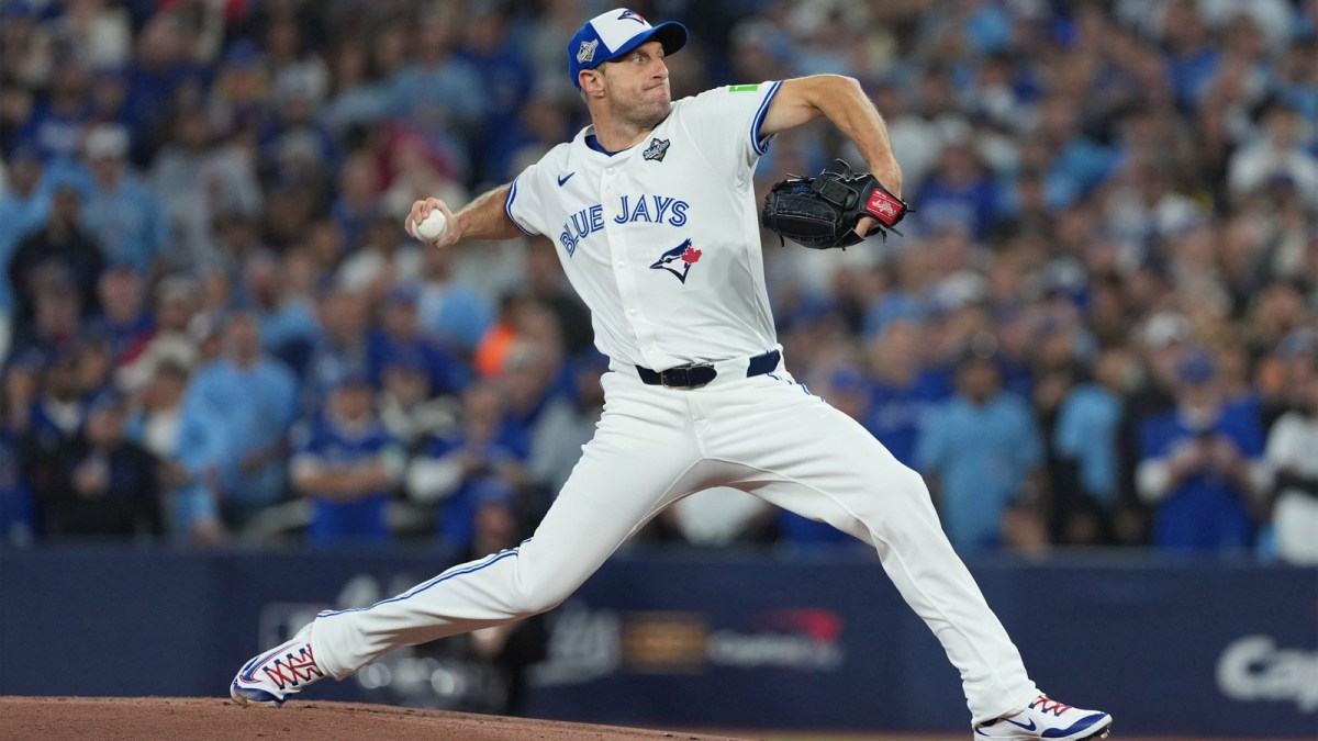 Toronto Blue Jays pitcher Max Scherzer (31) throws a pitch against the Los Angeles Dodgers in the first inning for game seven of the 2025 MLB World Series at Rogers Centre.
