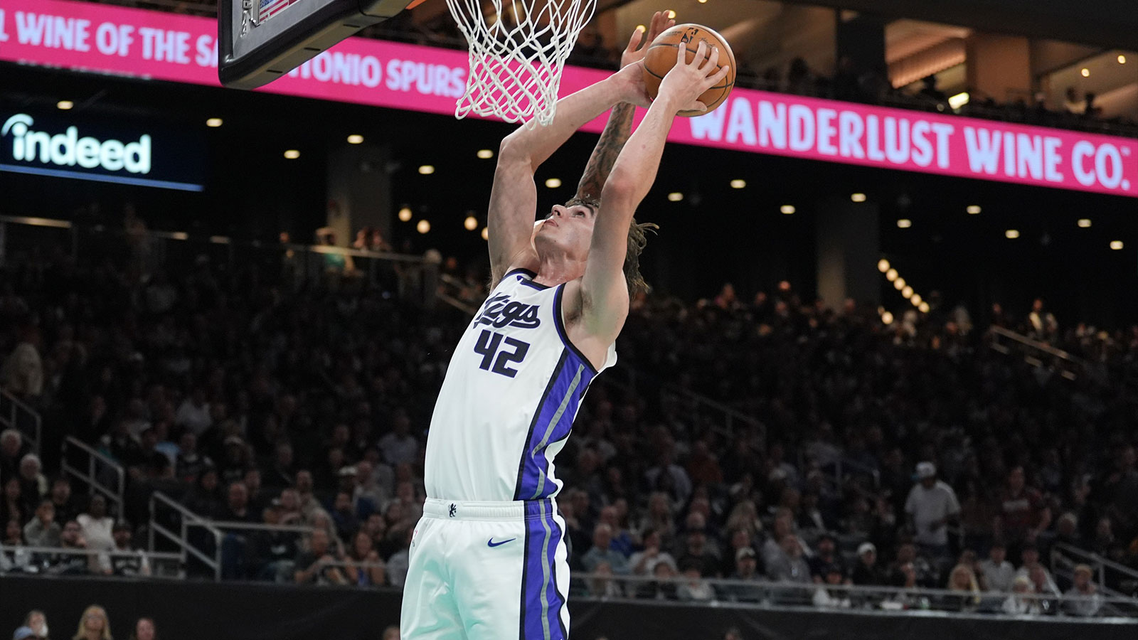 Sacramento Kings center Maxime Raynaud (42) goes up for a shot in the second half against the San Antonio Spurs at Moody Center.