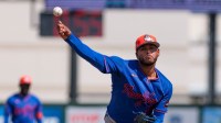 New York Mets starting pitcher Freddy Peralta (51) warms up against the St. Louis Cardinals during the first inning at Roger Dean Chevrolet Stadium.