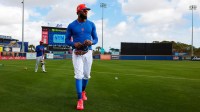 New York Mets outfielder Luis Robert Jr. (88) looks on from the field during spring trining at Clover Park.