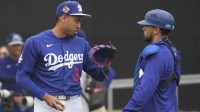 Los Angeles Dodgers pitcher Edwin Diaz (3) talks to his catcher during spring training camp.