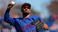 New York Mets second baseman Marcus Semien (10) tosses a baseball into the stands against the Houston Astros during the fourth inning at Clover Park.