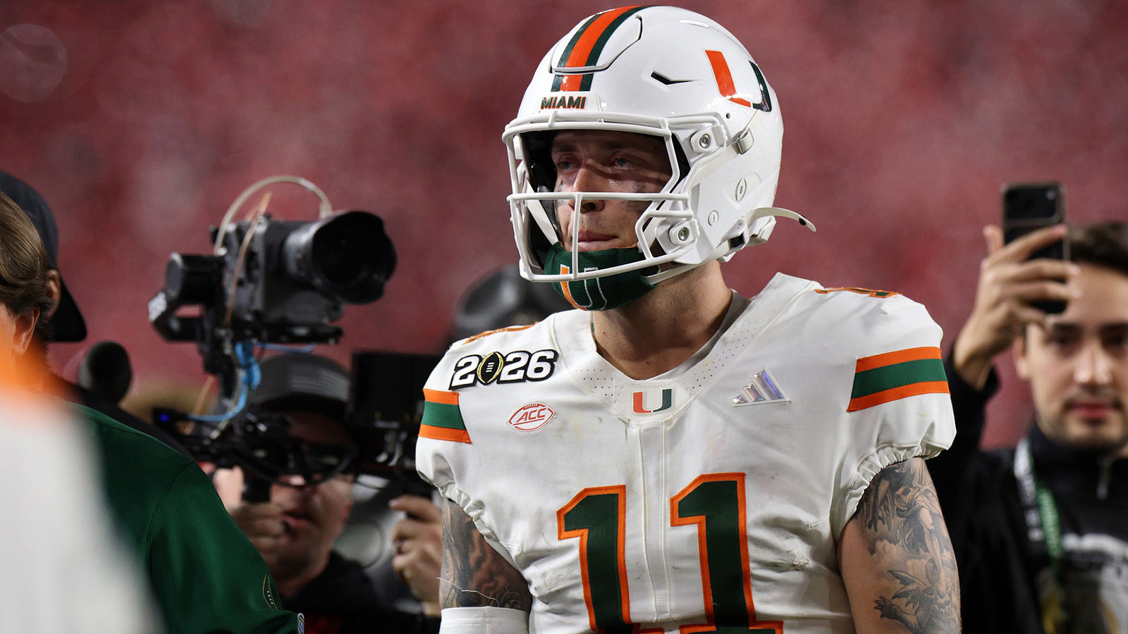 Miami Hurricanes quarterback Carson Beck (11) reacts after the College Football Playoff National Championship game at Hard Rock Stadium.