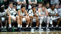 Michigan State's Kur Teng, Carson Cooper, Divine Ugochukwu, Jeremy Fears Jr., Jaxon Kohler and Coen Carr looks on from the bench