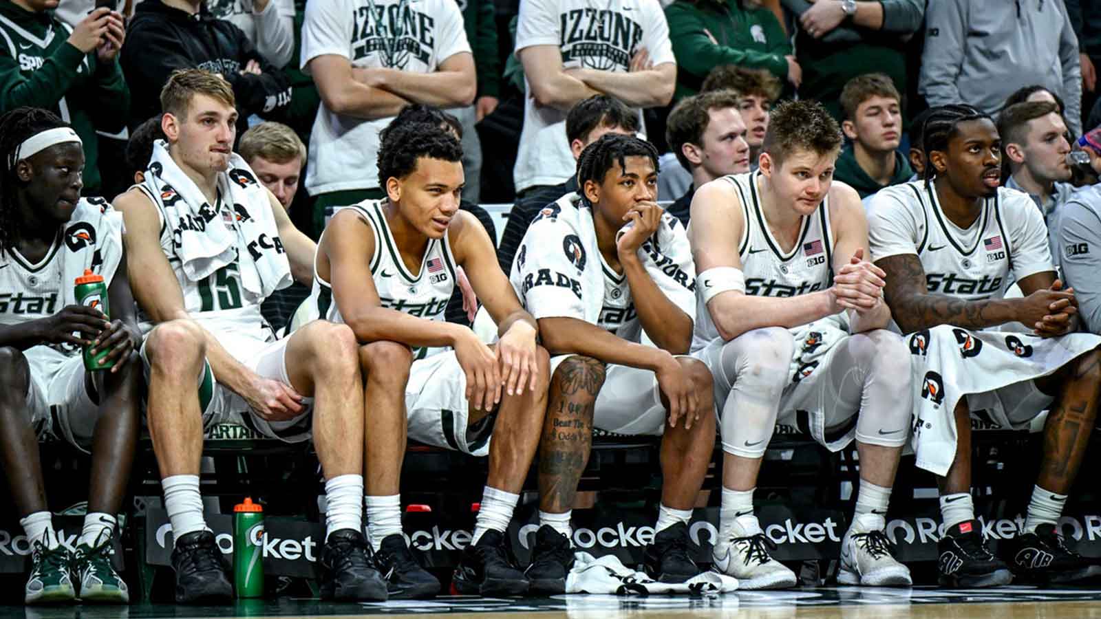 Michigan State's Kur Teng, Carson Cooper, Divine Ugochukwu, Jeremy Fears Jr., Jaxon Kohler and Coen Carr looks on from the bench during the second half in the game against Maryland