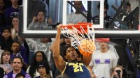 Michigan Wolverines forward Morez Johnson Jr. (21) dunks the ball against the Northwestern Wildcats during the second half at Welsh-Ryan Arena.