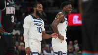 Jan 31, 2026; Memphis, Tennessee, USA; Minnesota Timberwolves guard Mike Conley (10) and guard Anthony Edwards (5) react during the third quarter against the Memphis Grizzlies at FedExForum. Mandatory Credit: Petre Thomas-Imagn Images