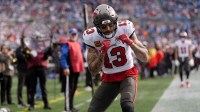 Tampa Bay Buccaneers wide receiver Mike Evans (13) reacts a touchdown during the first half against the Carolina Panthers at Bank of America Stadium.