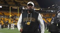 Pittsburgh Steelers head coach Mike Tomlin walks off the field after his team fell 30-6 to the Houston Texans during the NFL Wild Card game at Acrisure Stadium in Pittsburgh, PA on January 12, 2026.