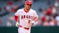 Los Angeles Angels designated hitter Mike Trout (27) runs after hitting a home run during the first inning against the Houston Astros at Angel Stadium.