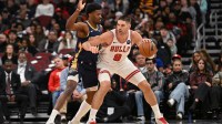 Chicago Bulls center Nikola Vucevic (9) controls the ball against New Orleans Pelicans center Yves Missi (21) during the second half at United Center.