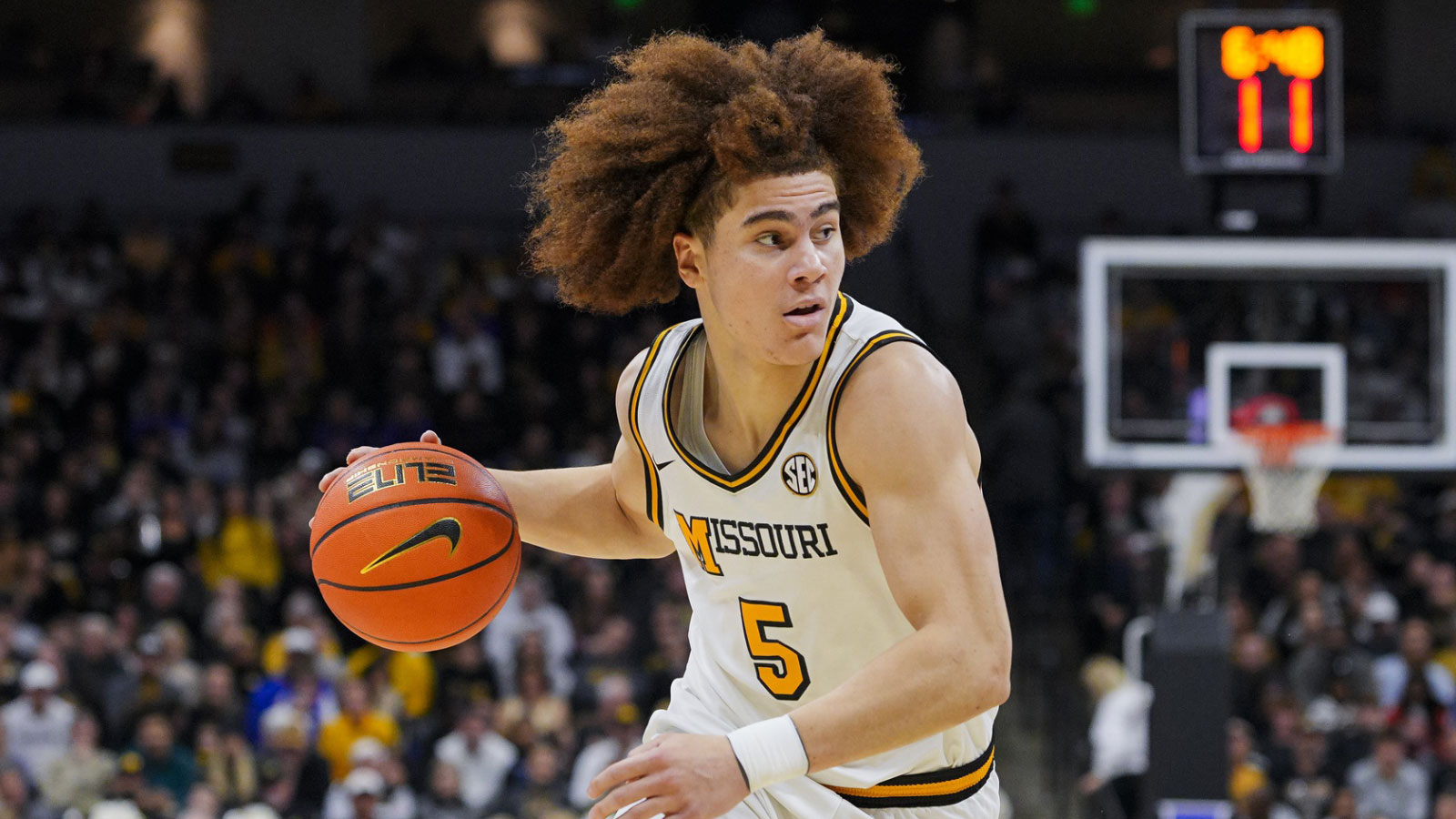Missouri Tigers guard T.O. Barrett (5) drives during the first half against the Florida Gators at Mizzou Arena.