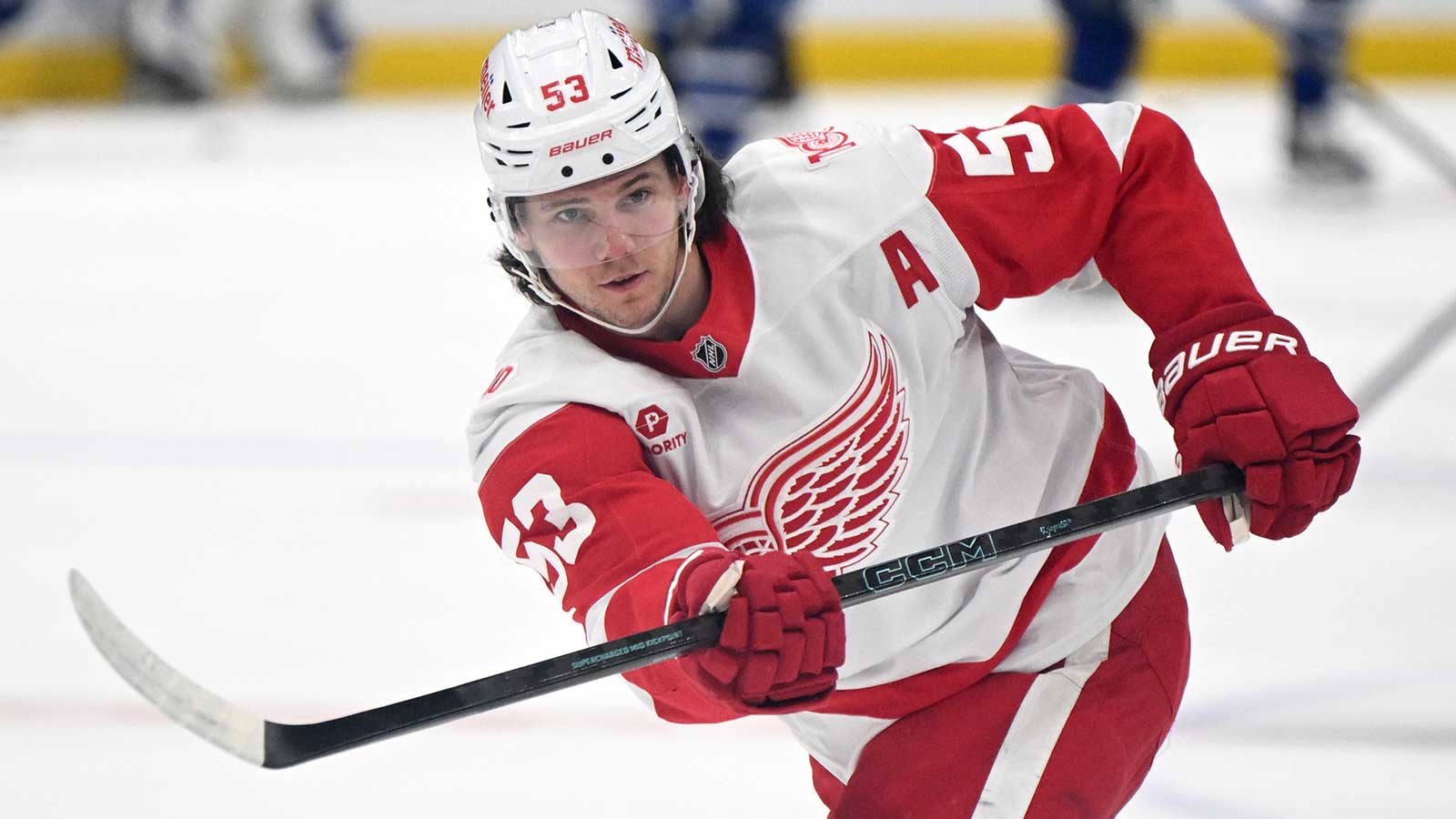 Detroit Red Wings defenseman Moritz Seider (53) warms up before playing the Toronto Maple Leafs at Scotiabank Arena. 