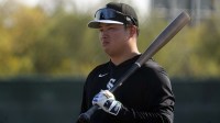 Chicago White Sox first baseman Munetaka Murakami (5) takes batting practice during spring training camp at Camelback Ranch.