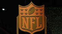 A NFL shield logo at the NFL Honors Red Carpet before Super Bowl LX at Palace of Fine Arts. Mandatory Credit: Kirby Lee-Imagn Images